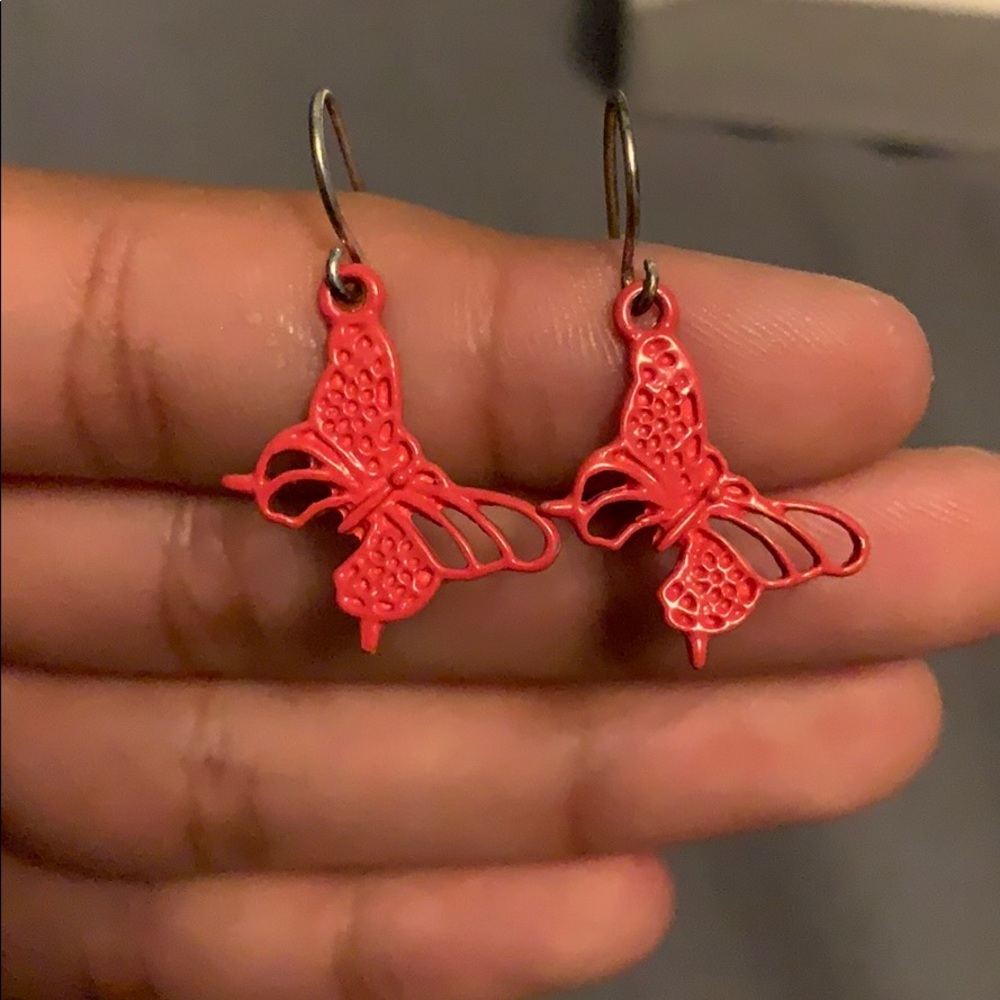Pink butterfly dangly earrings